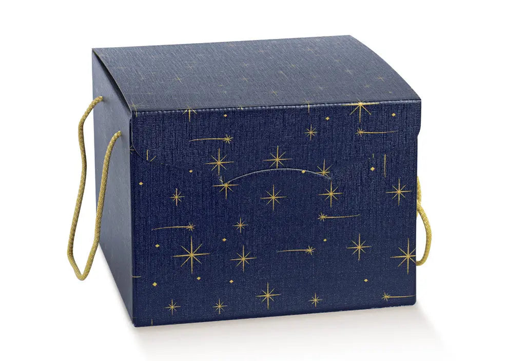 A navy blue textured gift box with gold star and constellation patterns, featuring two gold rope handles on the sides, shown on a white background.