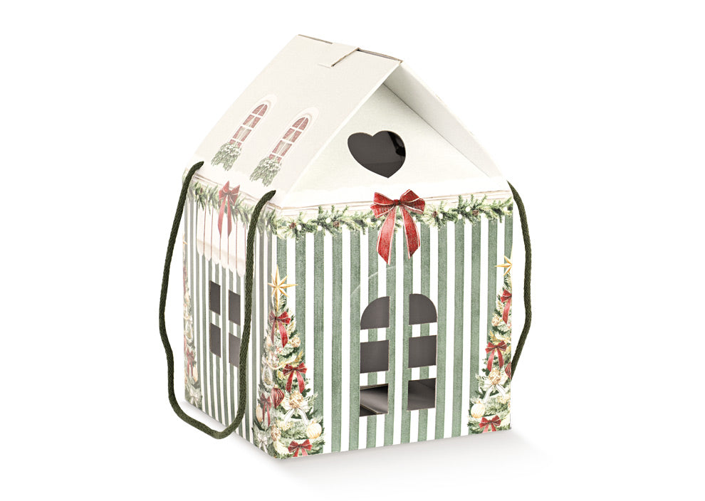 A house-shaped Christmas gift box with green and white vertical stripes, decorated with holiday tree illustrations, a red bow, and a heart-shaped window cutout on the roof, shown on a white background.